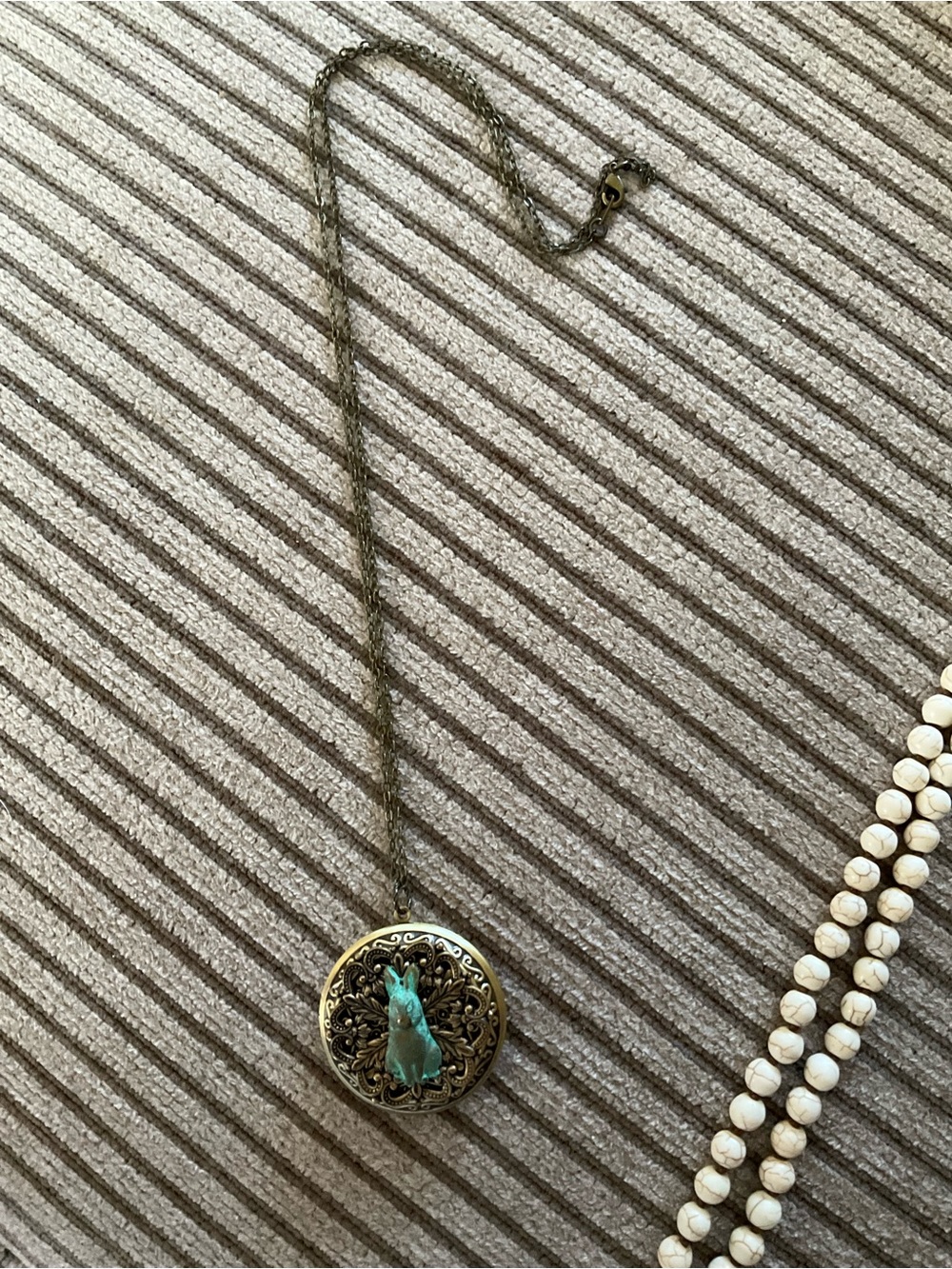 Bronze Filigree Pendant Necklace with Turquoise Rabbit Accent